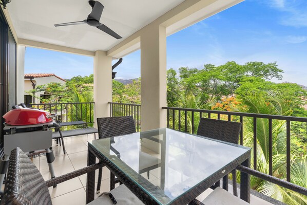 L811's covered terrace offers treetop views and ample room to spread out.  
