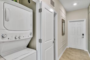 Laundry room w/ washer and dryer.