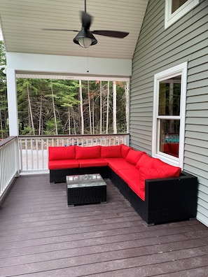 Large front porch with comfortable lounge furniture