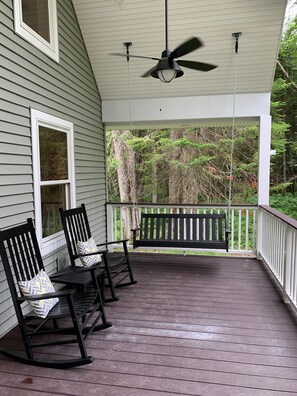 Large front porch with rockers and swing