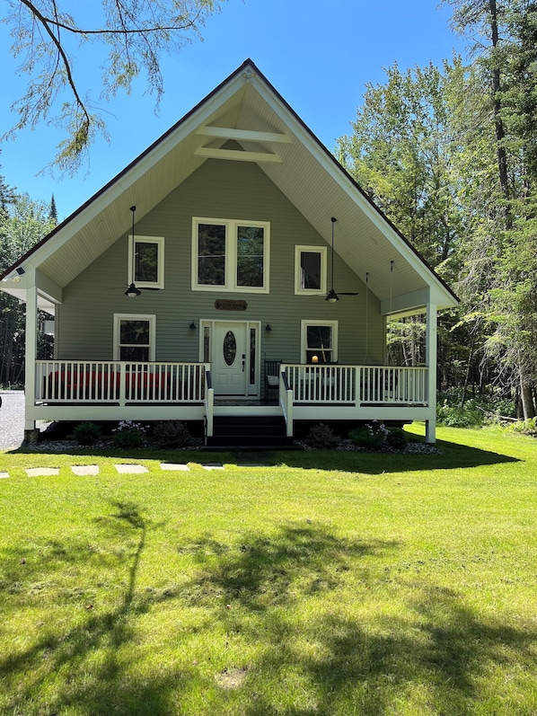 Front of home with large covered porch
