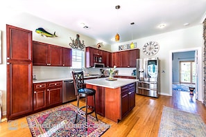 Open floor plan kitchen with dining space