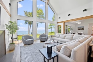 Open concept living room space with lake views. 