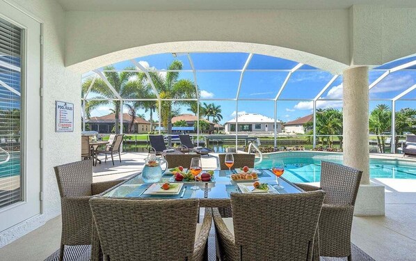 Enjoy Amazing Views from the Covered Lanai Dining Area
