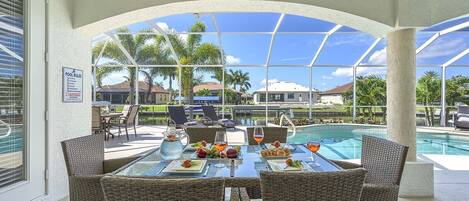 Enjoy Amazing Views from the Covered Lanai Dining Area