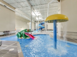 Toddlers pool area: slide and splash fountain.
