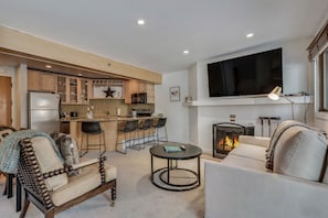 Living room with wood-burning fireplace