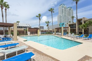 Jump in! The sparkling swimming pool is a nice place to relax after a day at the beach!