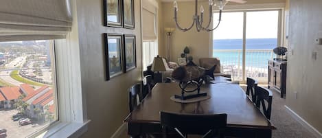 Dining area and family room with views of beach & strip. (Now has wood floors) 