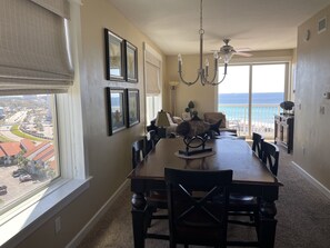 Dining area and family room with views of beach & strip. (Now has wood floors) 