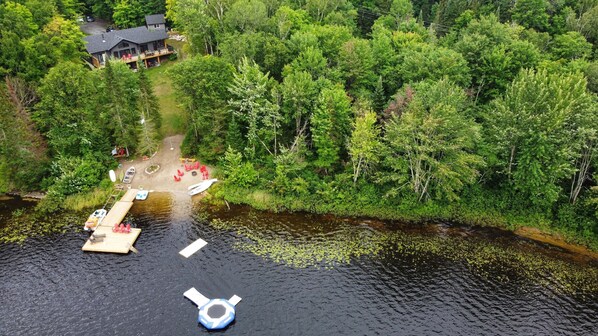 View of the property from the lake, no cottage neighbour on the west side.