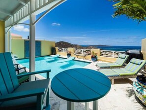 Private Patio with Table for 4 and lounge chairs