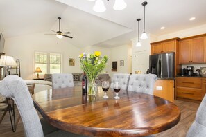 Locally sourced pine dining room table seats six comfortably.