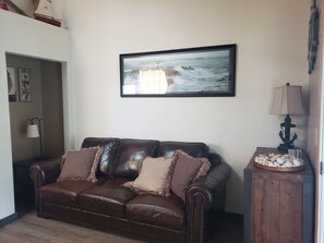 Queen sofa sleeper with memory foam topper, linen provided