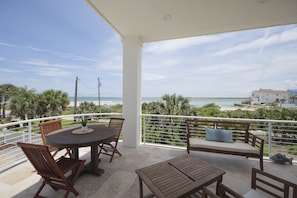 Personal Paradise - Multiple shaded balconies with comfortable patio furnishings invite you to linger outdoors as long as possible.