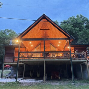 Large covered deck overlooking the stream below. 