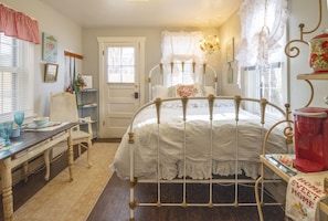 The heavenly antique iron full size bed with luxury linens is heavenly!