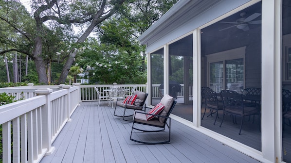 Screened in porch and deck overlooking the lagoon.