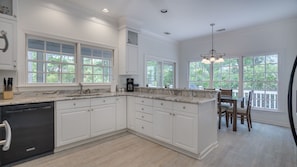 Open concept kitchen and dining area perfect for entertaining.