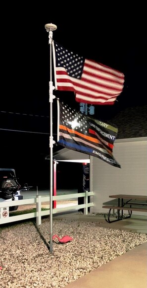 Our Flags Proudly Fly Over The Duncan Community Center Patio.