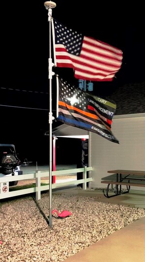 Our Flags Proudly Fly Over The Duncan Community Center Patio.
