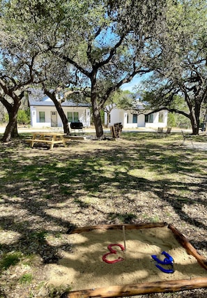 We have 2 BBQ pits, a fire pit , tree swings, horse shoes and free roaming deer.