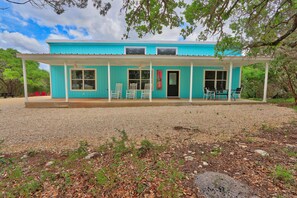 Blue House entrance with large front patio