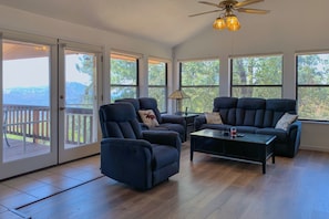 Patio doors out to large deck with stunning views, shade and sun relaxation.