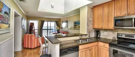 Renovated kitchen complete with appliances, cookware & dishes for your vacation.