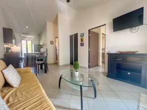 The unit has comfortable living room with Smart TV