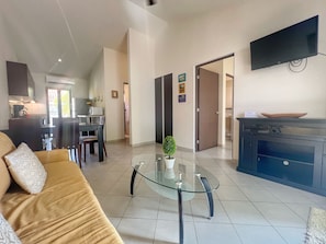 The unit has comfortable living room with Smart TV