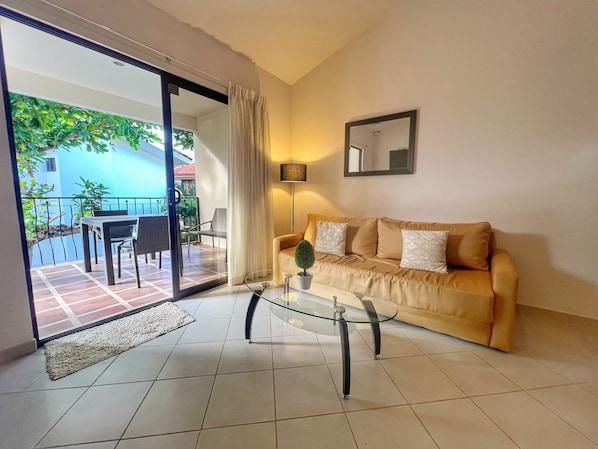 Jade Beach A6 is a second floor condo with vaulted ceilings and lots of natural light.