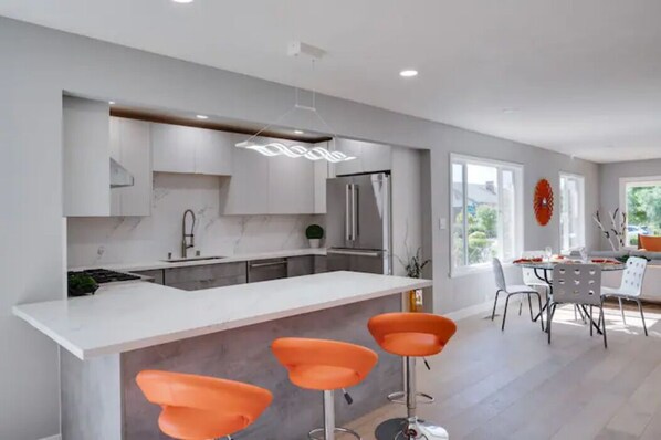 Kitchen island with barstools