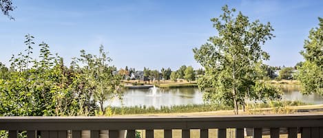 Serene lake view from balcony.