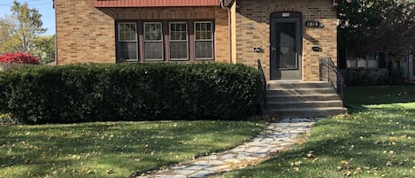 Front of home with front porch to sit outside and enjoy the views