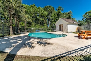 Swimming Pool with Bathroom surrounded by Palms & Greenery ~ Picnic Tables Available