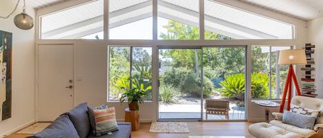 Mid-century modern's beauty of integrating indoor and outdoor living.