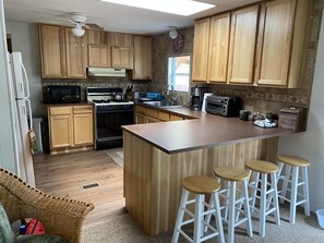 Kitchen with full amenities 