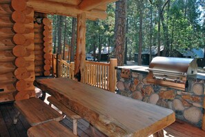 Front Deck with picnic table and gas grill