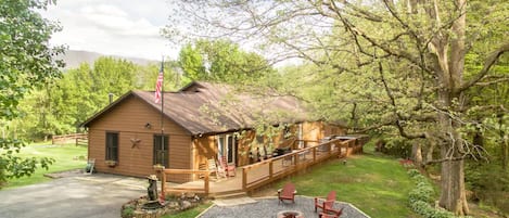 Golden Oaks, view looking the firepit and deck.