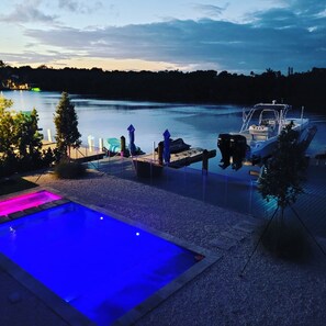 Second floor balcony sunset view of Pool, Dock & Harbor