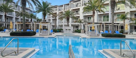 The resort style pool is seasonally heated and features private