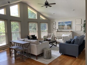 Great Room/Living Room with Smart TV and fold-out bed.  