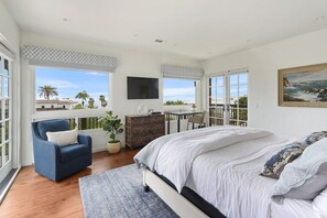 Master Suite bedroom with views of the ocean and cliffs