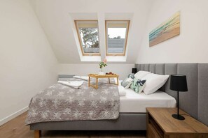 Comfortable bedroom with a double bed.