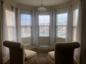 Relaxing sitting area in Captain's Quarters overlooking the channel.