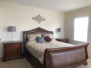 Captain's quarters with a California King bed.