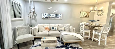 Updated living room & dinning room with a beachy vibe!