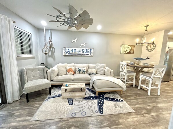 Updated living room & dinning room with a beachy vibe!