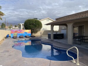 15' by 34' pool with Baja shelf